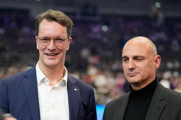 Hendrik Josef Wüst (Ministerpräsident des Landes Nordrhein-Westfalen) und Alexander Kalouti (Oberbürgermeister der Stadt Dortmund) looks on during the 27th IHF Women s Handball World Championship, WM, Weltmeisterschaft - Main Round match between Germany and Faroe Islands at Westfalenhalle on December 2, 2025 in Dortmund, Germany. (Photo by Alex Gottschalk DeFodi Images)