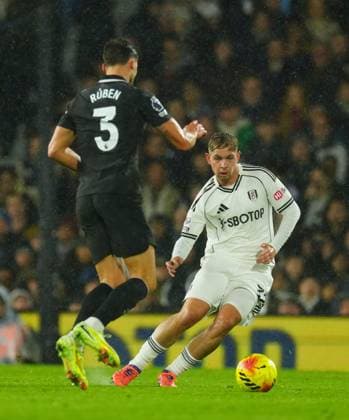 Emile Smith Rowe of Fulham and Ruben Dias of Manchester City Fulham v Manchester City, Premier League, Football, Craven Cottage, London, UK - 02 Dec 2025London Craven Cottage United Kingdom EDITORIAL USE ONLY No use with unauthorised audio, video, data, fixture lists, club league logos or live services. Online in-match use limited to 120 images, no video emulation. No use in betting, games or single club league player publications. Copyright: xJavierxGarcia Shutterstockx 16005566al
