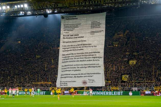 Choreographie der Fans von Borussia Dortmund a das Innenministerium. Choreography of the fans of Borussia Dortmund to the Ministry of the Interior. Borussia Dortmund - Bayer Leverkusen, DFB Pokal Achtelfinale (Round of 16) in Dortmund, Signal Iduna Park DFL regulations prohibit any use of photographs as image sequences and or quasi-video. Copyright: HMBxMedia xMarcoxBader