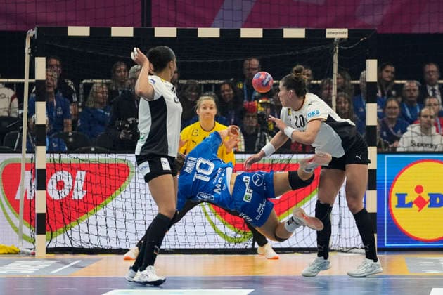 Suna Hansen (Faroe Islands) und Emily Vogel (Germany) battle for the ball during the 27th IHF Women s Handball World Championship, WM, Weltmeisterschaft - Main Round match between Germany and Faroe Islands at Westfalenhalle on December 2, 2025 in Dortmund, Germany. (Photo by Alex Gottschalk DeFodi Images)