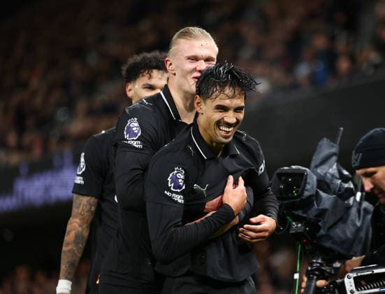 London, England, 2nd December 2025. Tijjani Reijnders of Manchester City celebrates scoring their second goal with Erling Haaland of Manchester City during the Fulham vs Manchester City Premier League match at Craven Cottage, London. Picture credit should read: Paul Terry Sportimage EDITORIAL USE ONLY. No use with unauthorised audio, video, data, fixture lists, club league logos or live services. Online in-match use limited to 120 images, no video emulation. No use in betting, games or single club league player publications. SPI_032_PT_Fulham_Man_City SPI-4339-0031