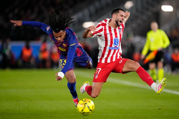 FC Barcelona, Barca v Atletico de Madrid - LaLiga EA Sports Jules Kounde centre-back of Barcelona and France and David Hancko centre-back of Atletico de Madrid and Slovakia compete for the ball during the La Liga EA Sports match between FC Barcelona and Atletico de Madrid at Spotify Camp Nou on December 2, 2025 in Barcelona, Spain. Barcelona Spain  Copyright: xJosexBretonx originalFilename:bretonhernandez-fcbarcel251202_npLgs.jpg