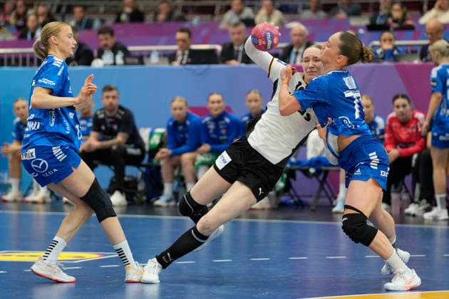 Nieke Kühne (Germany) und Jana Mittun (Faroe Islands) battle for the ball during the 27th IHF Women s Handball World Championship, WM, Weltmeisterschaft - Main Round match between Germany and Faroe Islands at Westfalenhalle on December 2, 2025 in Dortmund, Germany. (Photo by Alex Gottschalk DeFodi Images)