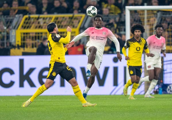 Zweikampf zwischen: duel between: Ernest POKU (Bayer 04 Leverkusen, 19) and Emre CAN (Borussia Dortmund, 23) Borussia Dortmund - Bayer Leverkusen, DFB Pokal Achtelfinale (Round of 16) in Dortmund, Signal Iduna Park DFL regulations prohibit any use of photographs as image sequences and or quasi-video. Copyright: HMBxMedia xMarcoxBader
