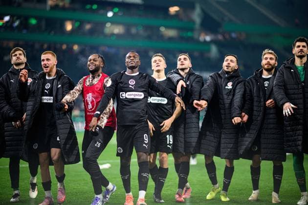 MOENCHENGLADBACH, GERMANY - 2 DECEMBER, 2025: Ricky Jade-Jones, Abdoulie Ceesay, Martijn Kaars and players aftermatch - The DFB Pokal, German Cup, match Borussia vs St.Pauli at Borussia Park.  Copyright: xVitaliixKliuievx