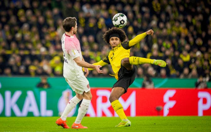 Dortmund, Germany. 02nd Dec 2025. . Karim Adeyemi (BVB) Jonas Hofmann (Leverkusen) Borussia Dortmund - Bayer Leverkusen 02.12.2025