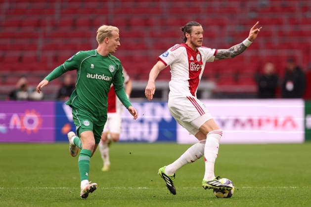 Wout Weghorst of AFC Ajax with Thijmen Blokzijl of FC Groningen during the match AFC Ajax Amsterdam vs FC Groningen at the Johan Cruijff ArenA for the Dutch Vriendenloterij Eredivisie season 2025-2026 in AMSTERDAM, Netherlands on 1 december 2025, (photo by Peter Lous EYE4images DeFodi Images)