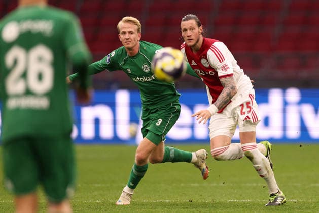 Wout Weghorst of AFC Ajax with Thijmen Blokzijl of FC Groningen during the match AFC Ajax Amsterdam vs FC Groningen at the Johan Cruijff ArenA for the Dutch Vriendenloterij Eredivisie season 2025-2026 in AMSTERDAM, Netherlands on 1 december 2025, (photo by Peter Lous EYE4images DeFodi Images)