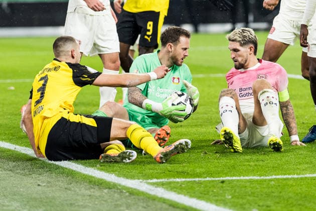 DORTMUND, GERMANY - DECEMBER 2: Mark Flekken (Bayer 04 Leverkusen, 1) catches the ball during the DFB Pokal Round of 16 match between Borussia Dortmund vs. Bayer 04 Leverkusen at Signal Iduna Park on Round of Sixteen of the DFB Pokal on December 2, 2025 in Dortmund, Germany. DFB REGULATIONS PROHIBIT ANY USE OF PHOTOGRAPHS AS IMAGE SEQUENCES AND OR QUASI-VIDEO. North Rhine Westphalia Germany Copyright: xBEAUTIFULxSPORTS Wunderlx