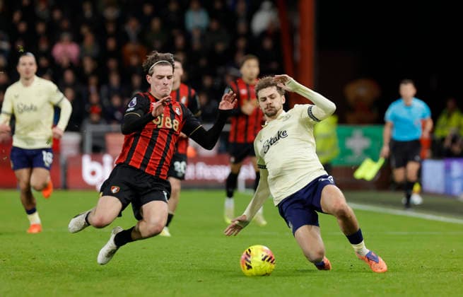 2nd December 2025, Bournemouth, Dorset, England; Premier League Football, AFC Bournemouth versus Everton; Alex Scott of Bournemouth slide tackles Kieran Dewsbury-Hall of Everton  HongboxChen