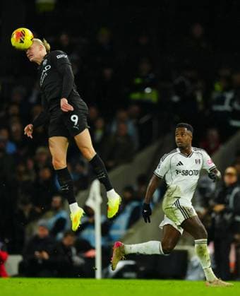 Erling Haaland of Manchester City heads as Ryan Sessegnon of Fulham looks on Fulham v Manchester City, Premier League, Football, Craven Cottage, London, UK - 02 Dec 2025London Craven Cottage United Kingdom EDITORIAL USE ONLY No use with unauthorised audio, video, data, fixture lists, club league logos or live services. Online in-match use limited to 120 images, no video emulation. No use in betting, games or single club league player publications. Copyright: xJavierxGarcia Shutterstockx 16005566fq