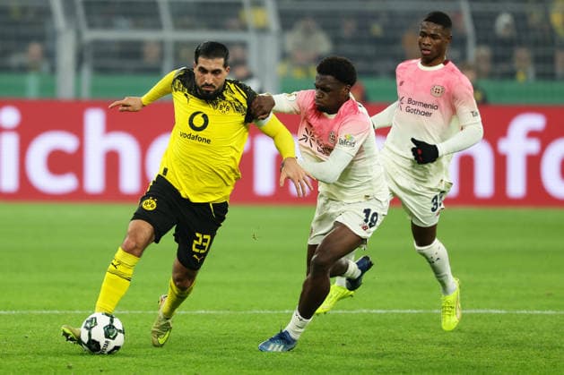 Dortmund, Signal Iduna Park, 02.12.25, GER, Herren, DFB-Pokal, Achtelfinale, Saison 2025 - 2026, Borussia Dortmund - Bayer 04 Leverkusen, Emre Can (Borussia Dortmund) und Ernest Poku (Bayer 04 Leverkusen) im Zweikampf, DFB DFL REGULATIONS PROHIBIT ANY USE OF PHOTOGRAPHS AS IMAGE SEQUENCES AND OR QUASI-VIDEO. Copyright: JoachimxBywaletz xJB-Sportfoto