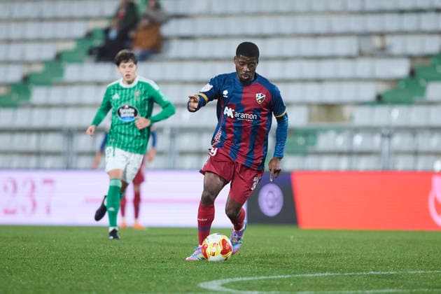 Racing Club Ferrol v SD Huesca - Copa del Rey FERROL, SPAIN - DECEMBER 2: Samuel Ntamack of SD Huesca runs with the ball during the Copa del Rey second round match between Racing Club Ferrol and SD Huesca at Campo Municipal A Malata on December 2, 2025 in Ferrol, Spain. (Photo by Diego Simon Photo Players Images Magara Press) Ferrol Estadio Municipal A Malata Spain Copyright: xDiegoxSimonx