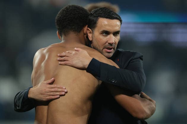 Bergamo, Italy, 3rd December 2025. Raffaele Palladino Head coach of Atalanta embraces Isak Hien of Atalanta following the final whistle of the Atalanta vs Genoa Coppa Italia match at New Balance Arena, Bergamo. Picture credit should read: Jonathan Moscrop Sportimage EDITORIAL USE ONLY. No use with unauthorised audio, video, data, fixture lists, club league logos or live services. Online in-match use limited to 120 images, no video emulation. No use in betting, games or single club league player publications. SPI_101_JM_ATALANTA_GENOA_CI SPI-4320-0101