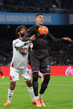 Napoli™s Lorenzo Lucca,Cagliari s Sebastiano Luperto during the round of 16 Frecciarossa Italian Cup 2025 2026 soccer match between Napoli and Cagliari at Maradona Stadium in Naples, south Italy - December 3, 2025. - Soccer  Copyright: xAlessandroxGarofalo LaPressex