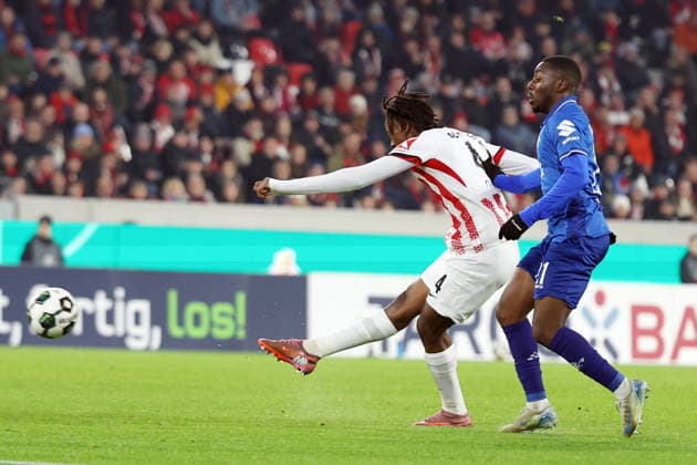 03.12.2025, xrekx, Fussball DFB Pokal 1 8 Finale, SC Freiburg - SV Darmstadt 98 v.l. Johan Manzambi (SC Freiburg) Merveille Papela (SV Darmstadt 98) (DFL DFB REGULATIONS PROHIBIT ANY USE OF PHOTOGRAPHS as IMAGE SEQUENCES and or QUASI-VIDEO) Freiburg