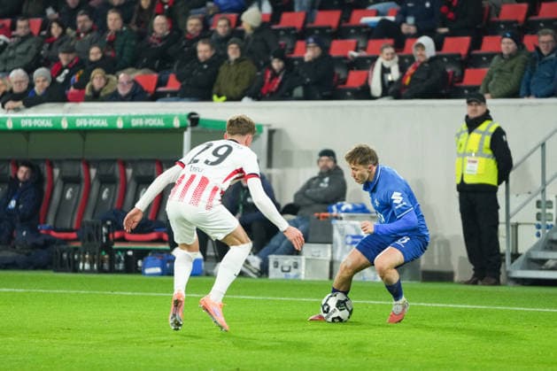 DFB-Pokal: SC Freiburg vs SV Darmstadt 98, 03.12.2025 Zweikamopf zwischen Philipp Treu (SC Freiburg, 29)und Luca Marseiler (SV Darmstadt 98, 8) DFB-Pokal: SC Freiburg vs SV Darmstadt 98, Europa-Park-Stadion, 03.12.2025 DFB DFL REGULATIONS PROHIBIT ANY USE OF PHOTOGRAPHS AS IMAGE SEQUENCES AND OR QUASI-VIDEO. Copyright: xBEAUTIFULxSPORTS Boscox