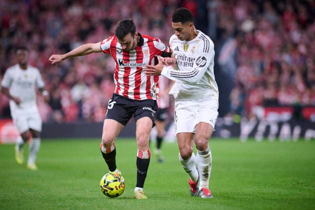 Athletic de Bilbao™s Inigo Lekue (L) and Real Madrid™s Jude Bellingham during La Liga match. December 03 ,2025. (20251203024)