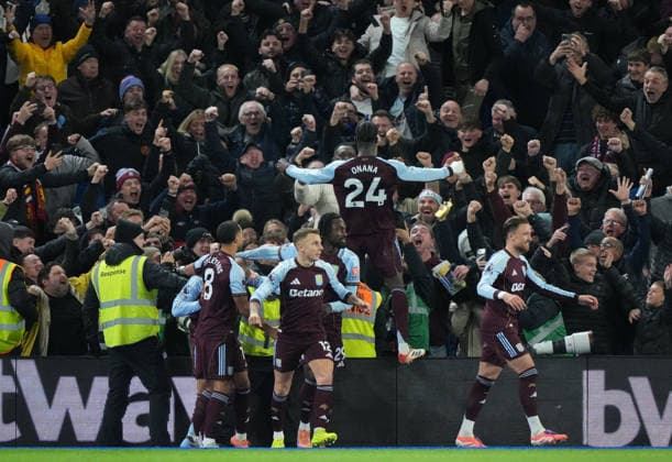 Brighton and Hove Albion v Aston Villa, Premier League, Football, Amex Stadium, Brighton, UK - 03 Dec 2025 GOAL 2-4. Amadou Onana of Aston Villa celebrates with the fans as Donyell Malen of Aston Villa is mobbed for scoring the fourth goal. Brighton Amex Stadium Brighton GBR, UK NEWSPAPERS OUT Copyright: xSeanxRyanx