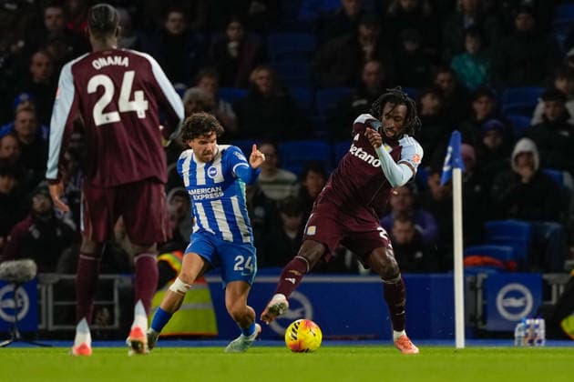 Brighton and Hove Albion v Aston Villa Premier League 03 12 2025. Aston Villa forward Evann Guessand (29) beats Brighton & Hove Albion manager defender Ferdi Kadioglu (24) to the ball during the Premier League match between Brighton and Hove Albion and Aston Villa at the American Express Stadium, Brighton and Hove, England on 3 December 2025. Brighton and Hove American Express Stadium East Sussex England Editorial use only DataCo restrictions apply See www.football-dataco.com , Copyright: xStephenxFlynnx PSI-23328-0086