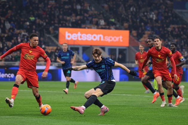 Milan, Italy, 3rd December 2025. Joel Schingtienne of Venezia FC attempts to block a shot from Matteo Spinacce of FC Internazionale during the Internazionale vs Venezia Coppa Italia match at Giuseppe Meazza, Milan. Picture credit should read: Jonathan Moscrop Sportimage EDITORIAL USE ONLY. No use with unauthorised audio, video, data, fixture lists, club league logos or live services. Online in-match use limited to 120 images, no video emulation. No use in betting, games or single club league player publications. SPI_103_JM_INTER_VENEZIA_CI SPI-4321-0101