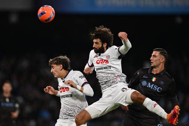 CALCIO - Coppa Italia - SSC Napoli vs Cagliari Calcio Sebastiano Luperto of Cagliari Calcio and Lorenzo Lucca of S.S.C. Napoli are in action during the round of 16 of the Coppa Italia Frecciarossa between S.S.C. Napoli and Cagliari Calcio at the Diego Armando Maradona Stadium on December 3, 2025 in Naples, Italy. Naples Italy  Copyright: xIPAxSport ABACAx