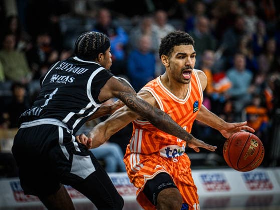 DJ Steward (Dolomiti Energia Trento) und Mark Smith (ratiopharm ulm) battle for the ball during the Basketball Eurocup match between ratiopharm ulm and Dolomiti Energia Trento at ratiopharm Arena on December 4, 2025 in Neu-Ulm, Germany. (Photo by Harry Langer DeFodi Images)
