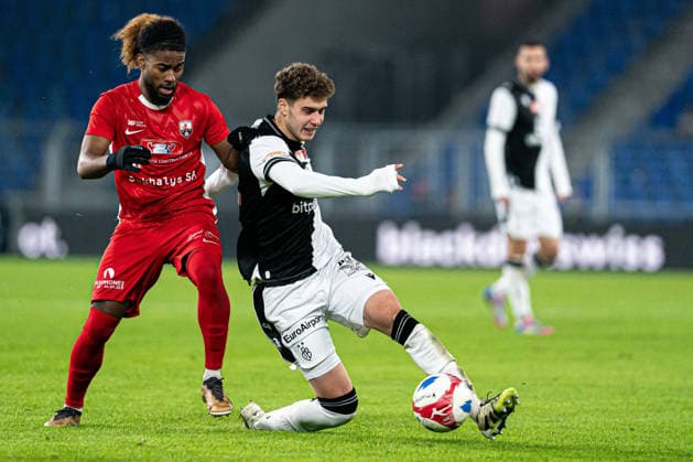 Andrej Bacanin (14 FC Basel 1893), right, and Theophilious Opoku Mensah (12 FC Grand-Saconnex), left, in action during the Swiss Cup Round of 16 match between FC Grand-Saconnex and FC Basel 1893 at St. Jakob-Park, Basel, Switzerland. Copyright: xPriscilaxBütlerx xSPPx Sportspressphoto_SPR69793
