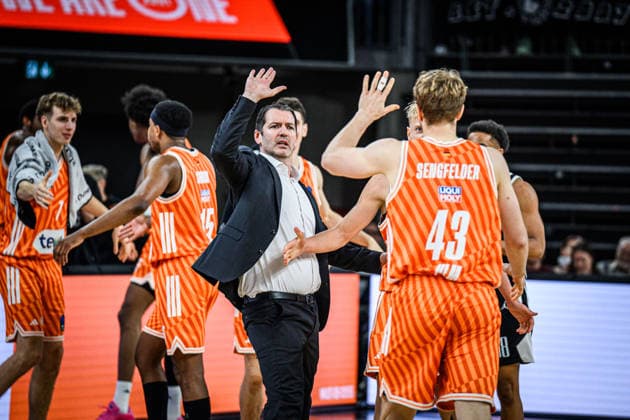 Head Coach Ty Harrelson (ratiopharm ulm) und Christian Sengfelder (ratiopharm ulm) gestures during the Basketball Eurocup match between ratiopharm ulm and Dolomiti Energia Trento at ratiopharm Arena on December 4, 2025 in Neu-Ulm, Germany. (Photo by Harry Langer DeFodi Images)