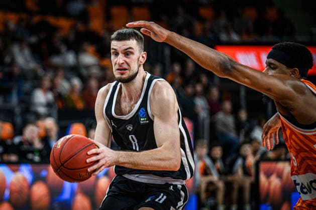 Matas Jogela (Dolomiti Energia Trento) und Justin Simon (ratiopharm ulm) battle for the ball during the Basketball Eurocup match between ratiopharm ulm and Dolomiti Energia Trento at ratiopharm Arena on December 4, 2025 in Neu-Ulm, Germany. (Photo by Harry Langer DeFodi Images)