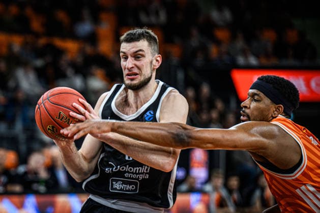 Matas Jogela (Dolomiti Energia Trento) und Justin Simon (ratiopharm ulm) battle for the ball during the Basketball Eurocup match between ratiopharm ulm and Dolomiti Energia Trento at ratiopharm Arena on December 4, 2025 in Neu-Ulm, Germany. (Photo by Harry Langer DeFodi Images)