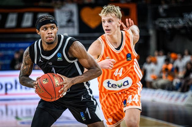 DJ Steward (Dolomiti Energia Trento) und Teo Milicic (ratiopharm ulm) battle for the ball during the Basketball Eurocup match between ratiopharm ulm and Dolomiti Energia Trento at ratiopharm Arena on December 4, 2025 in Neu-Ulm, Germany. (Photo by Harry Langer DeFodi Images)