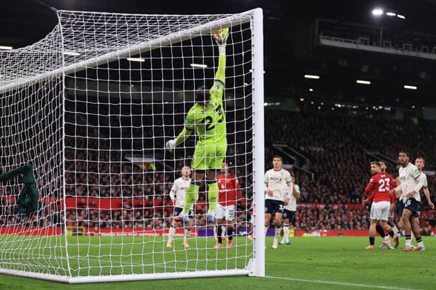 Football - Premier League - Manchester United, ManU v West Ham United 4th December 2025 - Premier League - Manchester United v West Ham United - West Ham United goalkeeper Alphonse Areola tips the ball over the bar - Photo: Simon Stacpoole Offside. Manchester UK Copyright: xSimonxStacpoolexOffside