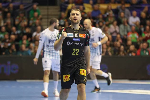 04.12.2025, xgox, Handball - EHF Champions League SC Magdeburg - Pick Szeged v.l. Lukas Mertens (Magdeburg, 22) Jubel, Torjubel, jubelt ueber das Tor, celebrate the goal, celebration Magdeburg