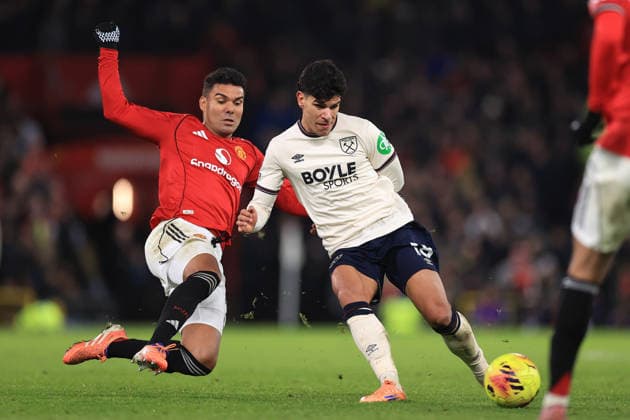 Football - Premier League - Manchester United, ManU v West Ham United 4th December 2025 - Premier League - Manchester United v West Ham United - Casemiro of Manchester United and Mateus Fernandes of West Ham United - Photo: Simon Stacpoole Offside. Manchester UK Copyright: xSimonxStacpoolexOffside