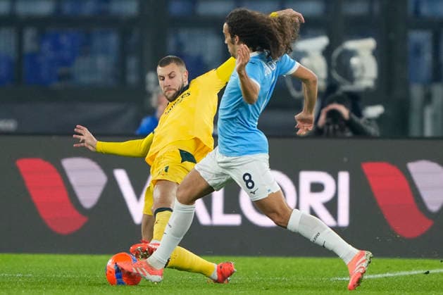 SS Lazio v AC Milan - Coppa Italia Strahinja Pavlovic of AC Milan competes for the ball with Matteo Guendouzi of S.S. Lazio during the Coppa Italia round of 16 match between SS Lazio and AC Milan at Olimpico Stadium in Rome, Italy, on December 4, 2025. Roma Italy  Copyright: xDaniloxDixGiovannix originalFilename:digiovanni-sslaziov251204_np8pK.jpg