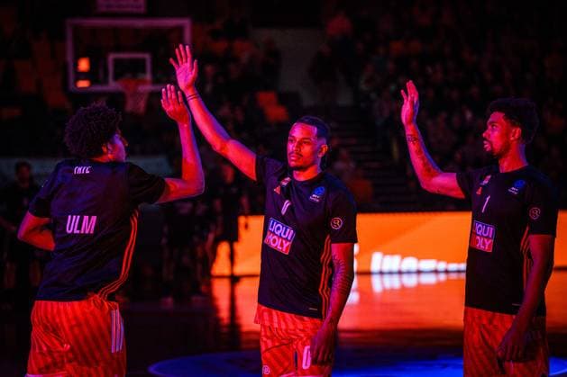 Joel Cwik (ratiopharm ulm), Nelson Weidemann (ratiopharm ulm) und Len Schoormann (ratiopharm ulm) gestures during the Basketball Eurocup match between ratiopharm ulm and Dolomiti Energia Trento at ratiopharm Arena on December 4, 2025 in Neu-Ulm, Germany. (Photo by Harry Langer DeFodi Images)