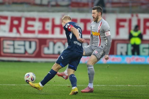 Valentin Laessig (TSG Hoffenheim II, 6), Christian Kuehlwetter (SSV Jahn Regensburg, 30) GER, TSG 1899 Hoffenheim II gegen SSV Jahn Regensburg, Fussball, 3.Liga, 17.Spieltag, Spielzeit 2025 2026, 06.12.2025 (DFL DFB REGULATIONS PROHIBIT ANY USE OF PHOTOGRAPHS as IMAGE SEQUENCES and or QUASI-VIDEO). GER,TSG 1899 Hoffenheim II gegen SSV Jahn Regensburg, Fussball, 3.Liga, 17.Spieltag, Spielzeit 2025 2026, 06.12.2025 Hoffenheim Copyright: xEibner-Pressefoto JoergxHirschx EP_JHH