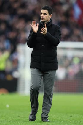 Birmingham, England, 6th December 2025. Mikel Arteta manager of Arsenal applauds the travelling fans after the Aston Villa vs Arsenal Premier League match at Villa Park, Birmingham. Picture credit should read: Gareth Evans Sportimage EDITORIAL USE ONLY. No use with unauthorised audio, video, data, fixture lists, club league logos or live services. Online in-match use limited to 120 images, no video emulation. No use in betting, games or single club league player publications. SPI_051_GE_ASTONVILLA_ARSENAL SPI-4350-0052