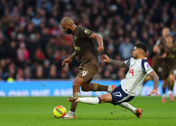 6th December 2025; Tottenham Hotspur Stadium, London, England; Premier League Football, Tottenham Hotspur versus Brentford; Cristian Romero of Tottenham Hotspur tackles Igor Thiago of Brentford  JohnxPatrickxFletcher