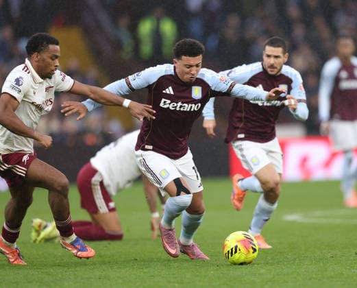 Jurrien Timber (A) Jadon Sancho (AV) at the Aston Villa v Arsenal EPL match, at Villa Park, Birmingham, UK on 6th December, 2025. 