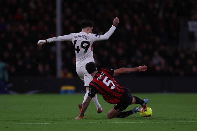 Football - 2025 2026 Premier League - AFC Bournemouth vs Chelsea - Vitality Stadium - Saturday 6th December 2025 Marcos Senesi of Bournemouth stretches into the tackle on Alejandro Garnacho of Chelsea only to injure himself during the Premier League match at the Vitality Stadium COLORSPORT Shaun Boggust 