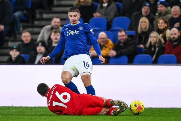 Liverpool, England, 6th December 2025. Vitalii Mykolenko of Everton is tackled by Nicolas Dominguez of Nottingham Forest during the Everton vs Nottingham Forest Premier League match at Hill Dickinson Stadium, Liverpool. Picture credit should read: Craig Thomas Sportimage EDITORIAL USE ONLY. No use with unauthorised audio, video, data, fixture lists, club league logos or live services. Online in-match use limited to 120 images, no video emulation. No use in betting, games or single club league player publications. SPI_059_CT_EVERTON_V_NOTTINGHAM_FOREST SPI-4353-0059