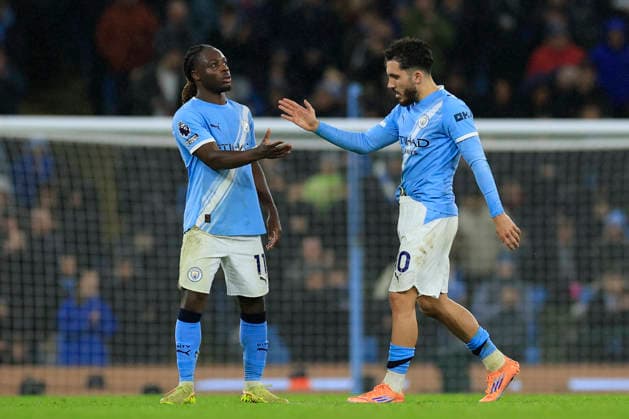 Manchester City v Sunderland Premier League 06 12 2025. Rayan Cherki (10) of Manchester City shakes hands with Jeremy Doku (11) of Manchester City as he is substituted during the Premier League match between Manchester City and Sunderland at the Etihad Stadium, Manchester, England on 6 December 2025. Manchester Etihad Stadium Manchester England Editorial use only DataCo restrictions apply See www.football-dataco.com , Copyright: xConorxMolloyx PSI-23347-0068