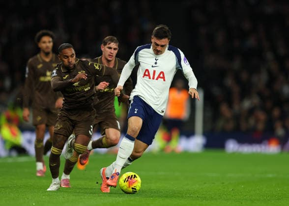 6th December 2025; Tottenham Hotspur Stadium, London, England; Premier League Football, Tottenham Hotspur versus Brentford; Joao Palhinha of Tottenham Hotspur challenged by Rico Henry of Brentford  JohnxPatrickxFletcher