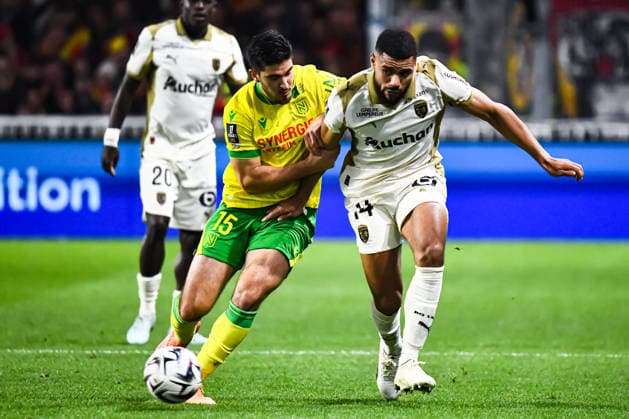 FOOTBALL : FC Nantes vs RC Lens - Ligue 1 - JournÃ e 15 - 06 12 2025 Mayckel Lahdo (FC NANTES) Matthieu Udol (RC Lens) NantesFrance  Copyright: xBaptistexAutissierx