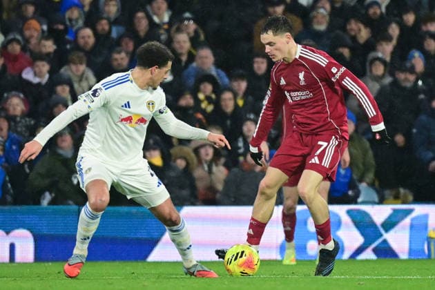 Leeds United v Liverpool Premier League 06 12 2025. Liverpool midfielder Florian Wirtz (7) takes on Leeds United midfielder Ethan Ampadu (4) during the Premier League match between Leeds United and Liverpool at Elland Road, Leeds, England on 6 December 2025. Leeds Elland Road West Yorkshire England Editorial use only DataCo restrictions apply See www.football-dataco.com , Copyright: xDennisxGoodwinx PSI-23360-0031