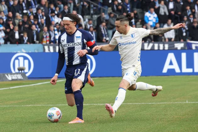 DEU, DFL, 2. FBL, Hertha BSC vs. 1: FC Magdeburg, 07.12.2025, Berliner Olympiastadion, Berlin, DEU, DFL, 2. FBL, Hertha BSC vs. 1: FC Magdeburg, im Bild Fabian Reese (Hertha BSC Berlin 11), Baris Atik (1.FC Magdeburg 23) DFL - regulations prohibit any use of Photographs as image sequences and or quasi-video