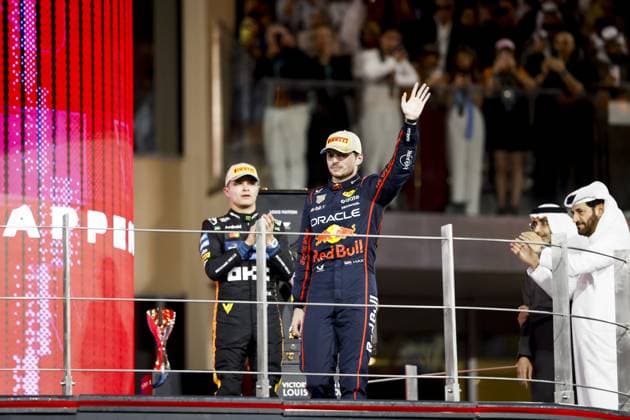 ABU DHABI Max Verstappen (Red Bull Racing) on the podium at the Yas Marina Circuit after winning the Abu Dhabi Grand Prix. Lando Norris (McLaren), who finished third, took the world title. ANP SANDER KONING xVIxANPxSportx xxANPxIVx 544181010 originalFilename: 544181010.jpg