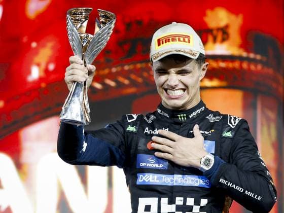 ABU DHABI Lando Norris (McLaren) celebrates his third-place finish and the world title on the podium at the Yas Marina Circuit after the Abu Dhabi Grand Prix. ANP SANDER KONING xVIxANPxSportx xxANPxIVx 544182046 originalFilename: 544182046.jpg